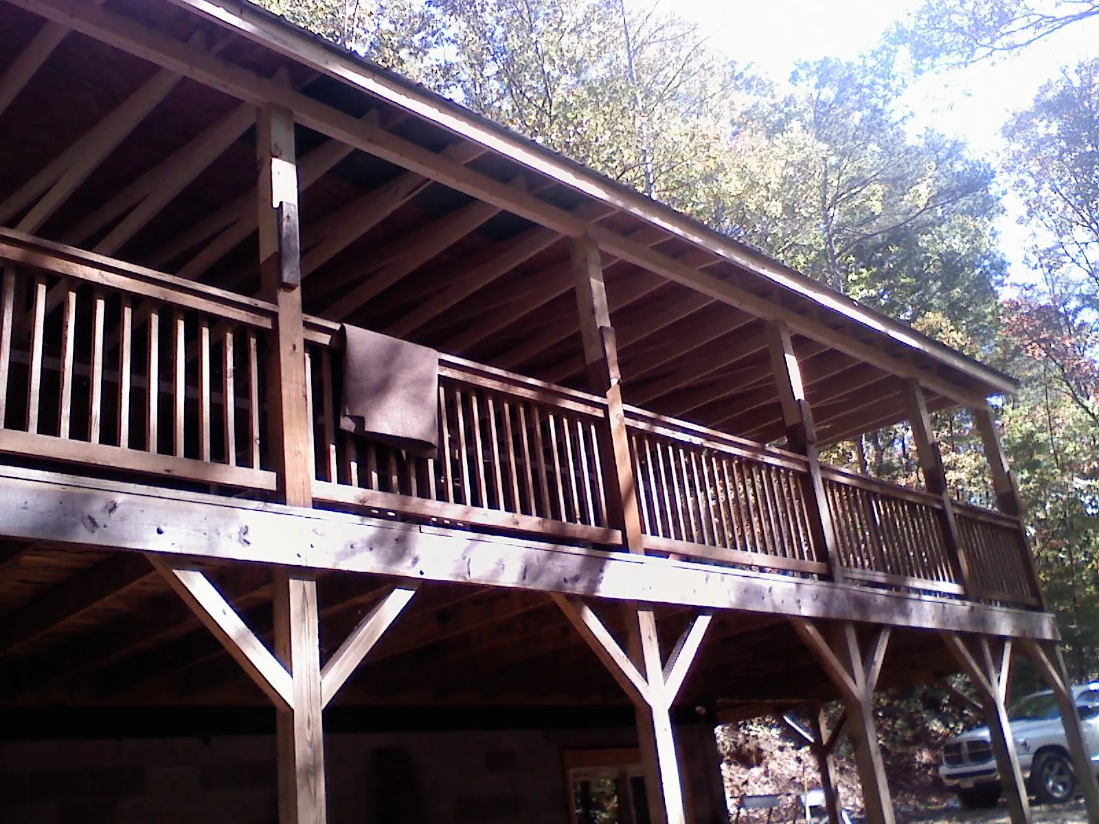 Timber framing under a new elevated porch and deck — Roof Leak Repair in Maquon by Roofing Brothers